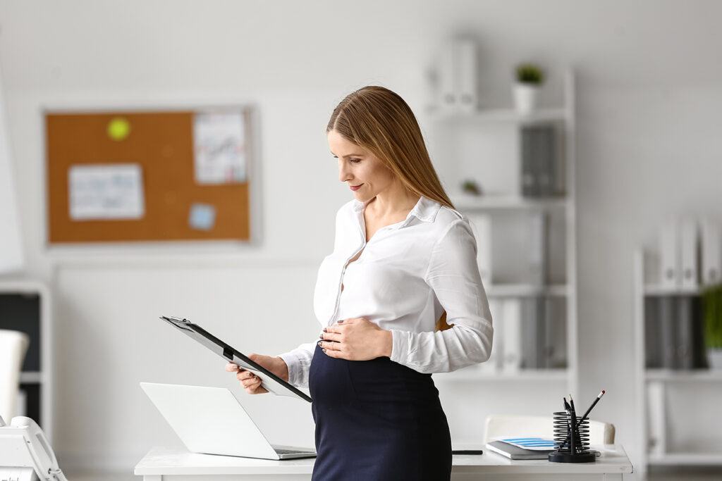 Pregnant employee experiencing changes in treatment at work and considering contacting a Temecula Employment Lawyer.