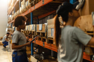 Employee experiencing emotional distress at work, reflecting anxiety and workplace mistreatment related to potential legal claims