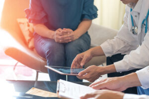 Employee reviewing medical leave paperwork with an employment attorney in California